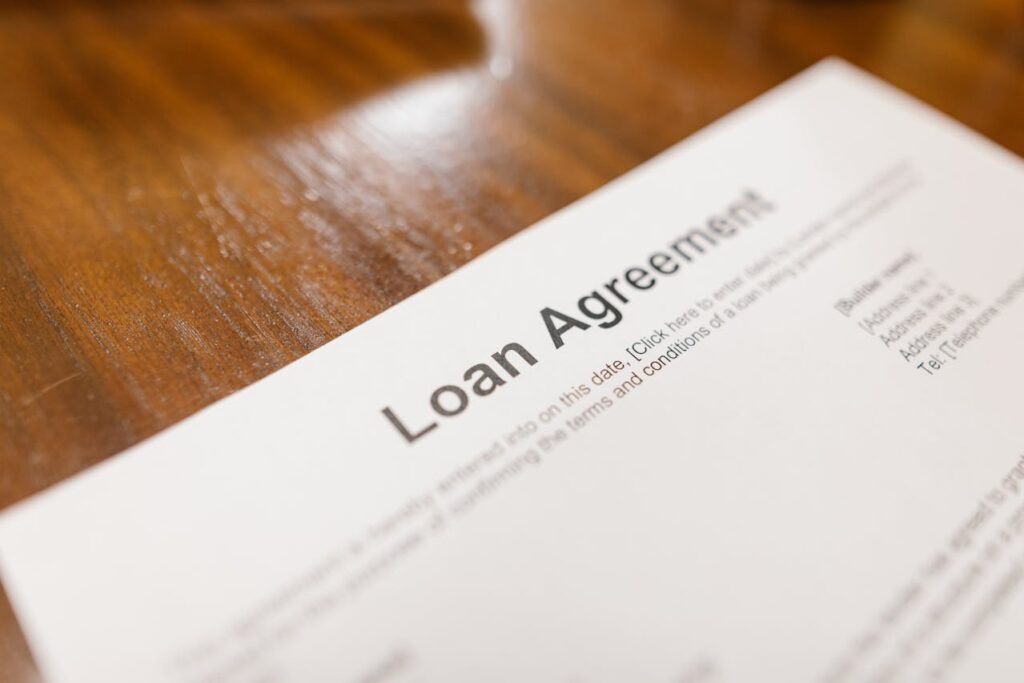 Loan agreement paperwork on desk